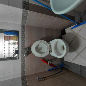 Bathroom in 2 BHK Apartment at Satellite Garden, Goregaon East – for Sale