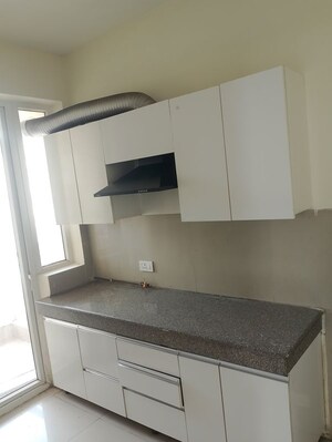 Kitchen in 3.5 BHK Apartment at Emaar Palm Hills, Sector 77 – for Rent