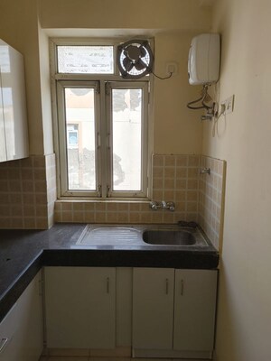 Kitchen in 2 BHK Apartment at Shree Vardhman Mantra, Sector 67 – for Rent