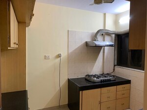 Kitchen in 3 BHK Apartment at Sheth Vasant Lawns, Laxmi Nagar – for Rent
