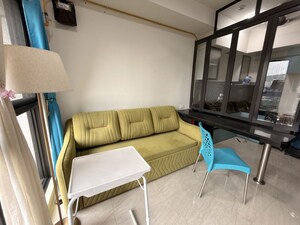 Living Room in 1 BHK Apartment at Lodha Crown Quality Homes, Majiwada – for Rent