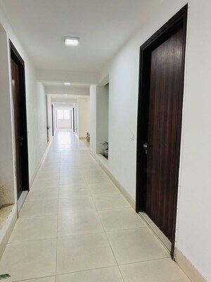 Building Lobby in 3.5 BHK Apartment at T Homes Phase 1, Siddharth Vihar – for Sale