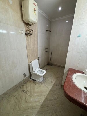 Bathroom in 3 BHK Builder Floor at Auram Floor, South City 2 – for Rent
