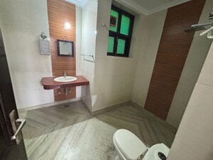 Bathroom in 3 BHK Builder Floor at Auram Floor, South City 2 – for Rent