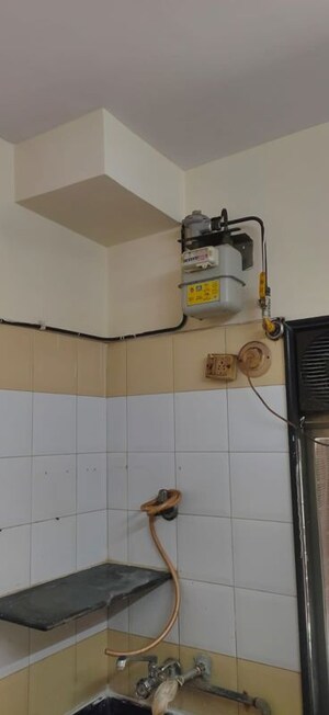 Kitchen in 1 BHK Apartment at Silver Sands CHS, Goregaon West – for Rent
