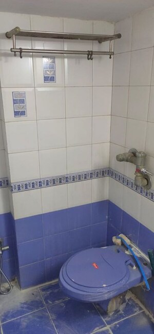 Bathroom in 1 BHK Apartment at Silver Sands CHS, Goregaon West – for Rent