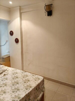 Master Bedroom in 2 BHK Apartment at Atlas Skywalker CHS, Andheri West – for Rent