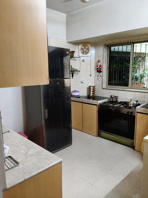 Kitchen in 2 BHK Apartment at Atlas Skywalker CHS, Andheri West – for Rent