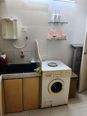 Kitchen in 2 BHK Apartment at Atlas Skywalker CHS, Andheri West – for Rent