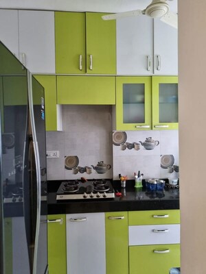 Kitchen in 2 BHK Apartment at Acme Stadium View, Andheri West – for Rent
