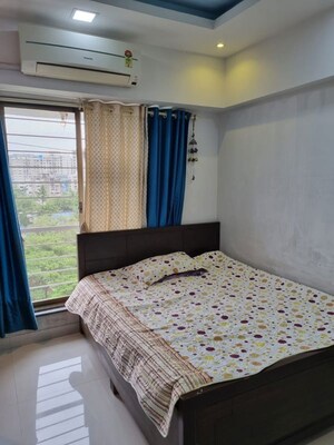 Master Bedroom in 2 BHK Apartment at Acme Stadium View, Andheri West – for Rent