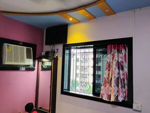 Bedroom in 1 BHK Apartment at The Makwana Om Palace, Malad West – for Rent
