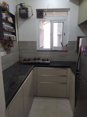 Kitchen in 2 BHK Apartment at Rustomjee Athena, Majiwada – for Rent