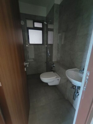 Bathroom in 1 BHK Apartment at Omkar Signet, Malad East – for Rent