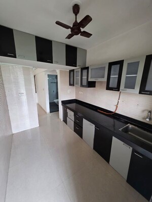 Kitchen in 2 BHK Apartment at Cosmos Jewels, Ghodbunder Road – for Rent