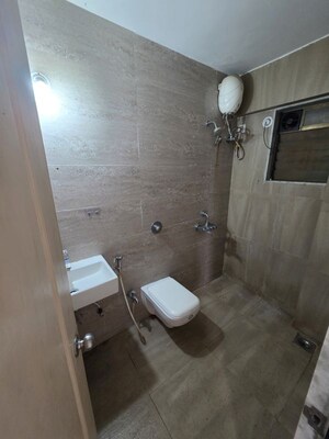 Bathroom in 2 BHK Apartment at Cosmos Jewels, Ghodbunder Road – for Rent