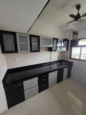 Kitchen in 2 BHK Apartment at Cosmos Jewels, Ghodbunder Road – for Rent