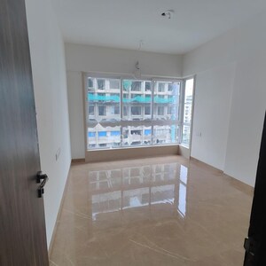 Room in 2 BHK Apartment at Upper East 97, Malad East – for Rent