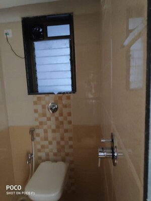 Bathroom in 2 BHK Apartment at Sethia Kalpavruksh Heights, Kandivali West – for Rent