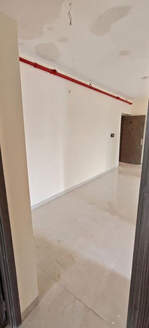 Room in 2 BHK Apartment at IM Applaud 38, Goregaon East – for Rent