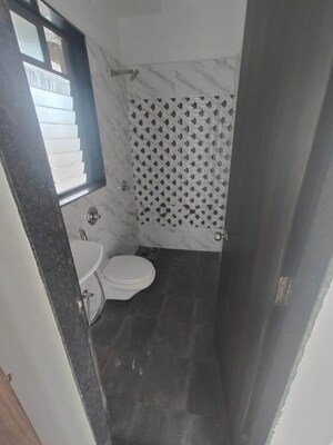 Bathroom in 1 BHK Apartment at UK Iridium, Kandivali East – for Rent