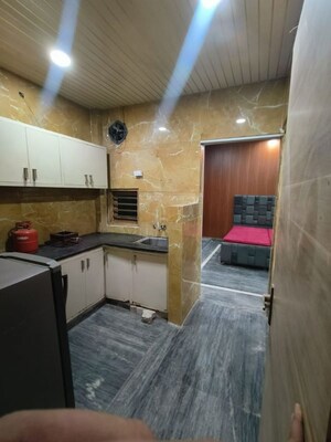 Kitchen in 1 RK Apartment at Sainik Farm – for Rent