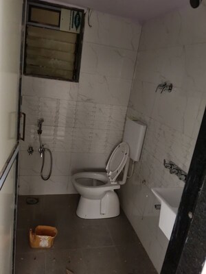 Bathroom in 1 BHK Apartment at Punyarthi Tower, Kalyan West – for Rent