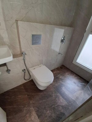Bathroom in 2 BHK Apartment at Ruparel Sky Green, Kandivali West – for Rent