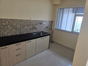 Kitchen in 2 BHK Apartment at Adhiraj Capital City Tower Oreka, Kharghar – for Sale