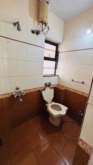 Bathroom in 2 BHK Apartment at Vasant Oscar, Mulund West – for Rent