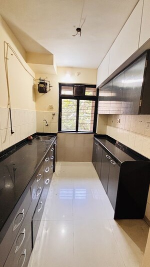 Kitchen in 2 BHK Apartment at Vasant Oscar, Mulund West – for Rent