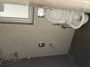 Bathroom in 2 BHK Apartment at Sheth Montana, Mulund West – for Rent