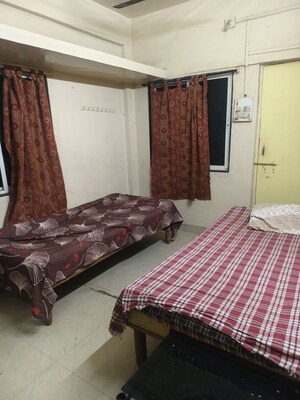 Bedroom in 2 BHK Apartment at Tejaswini Society, Aundh – for Rent