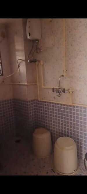 Bathroom in 2 BHK Apartment at Kamal Kunj Vile Parle, Vile Parle West – for Rent