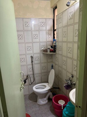 Bathroom in 2 BHK Apartment at Ganesh Residency, Pimple Saudagar – for Sale