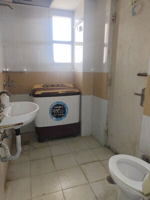 Bathroom in 2 BHK Apartment at Nitishree Aura Chimera, Raj Nagar Extension – for Rent