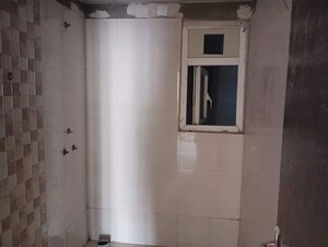 Building Lobby in 2.5 BHK Apartment at Amrapali Silicon City, Sector 76 – for Sale