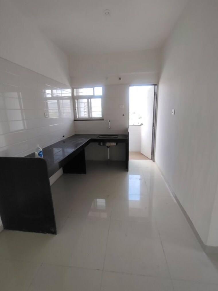 Kitchen, mahesh-el-regalo 2 Bedroom 1000 Sq.Ft. Apartment In Undri Pune 10637371