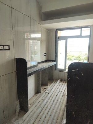 Kitchen in 1 BHK Apartment at Ayyappa Prerana Apartment, Goregaon West – for Sale