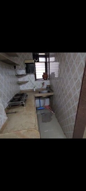Kitchen in 1 BHK Apartment at Varsha Apartment Vile Parle, Vile Parle West – for Rent