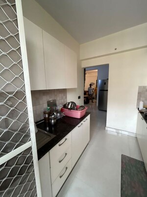 Kitchen in 3 BHK Apartment at Nitishree Aura Chimera, Raj Nagar Extension – for Rent