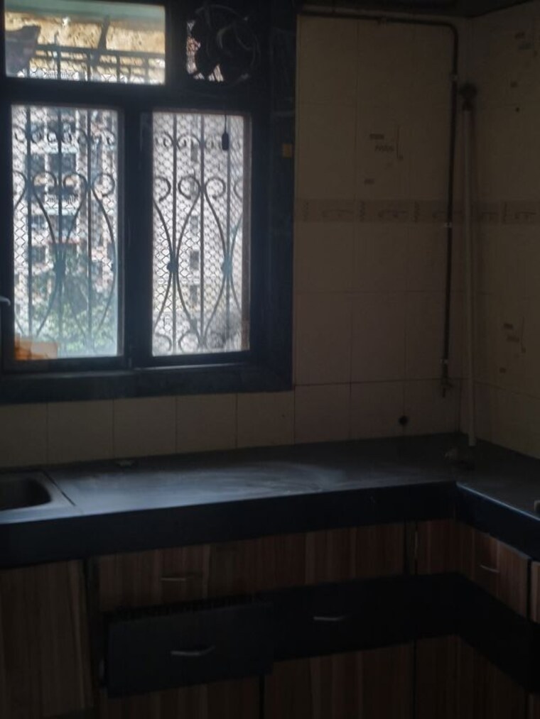 Kitchen, beturkar pada 1 Bedroom 550 Sq.Ft. Apartment In Beturkar Pada Thane 10637485