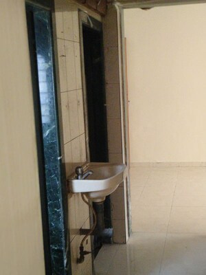 Bathroom in 1 BHK Apartment at Beturkar Pada – for Rent