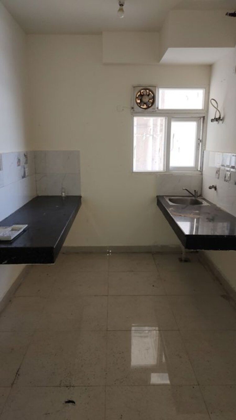 Kitchen, signature-global-the-roselia 2 Bedroom 569 Sq.Ft. Apartment In Sector 95a Gurgaon 10637517