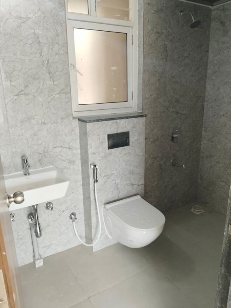 Bathroom, kolte-patil-life-republic-16th-avenue-arezo 2 Bedroom 850 Sq.Ft. Apartment In Hinjewadi Pune 10637509