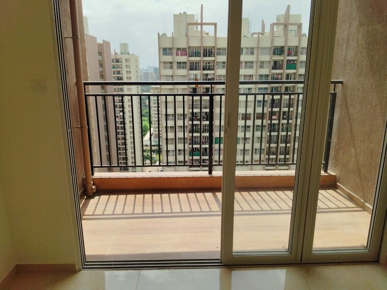 Balcony, kolte-patil-life-republic-16th-avenue-arezo 2 Bedroom 850 Sq.Ft. Apartment In Hinjewadi Pune 10637509