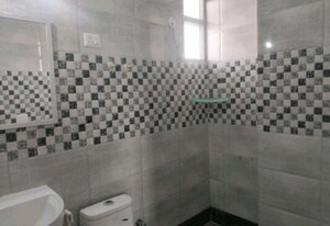 Bathroom in 3 BHK Apartment at Saya Gold Avenue, Vaibhav Khand – for Rent