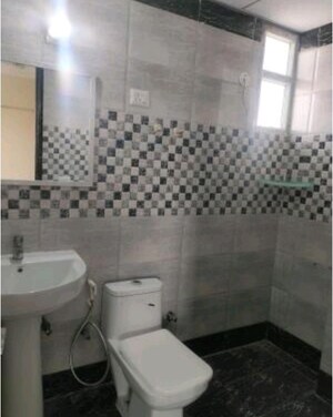 Bathroom in 3 BHK Apartment at Saya Gold Avenue, Vaibhav Khand – for Rent
