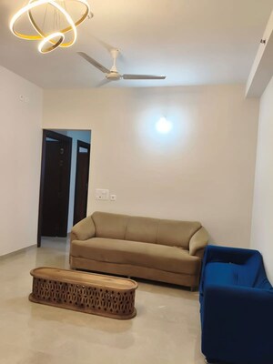 Living Room in 2 BHK Apartment at Duville Riverdale Grove, Kharadi – for Rent