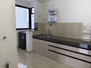 Kitchen in 2 BHK Apartment at Duville Riverdale Grove, Kharadi – for Rent